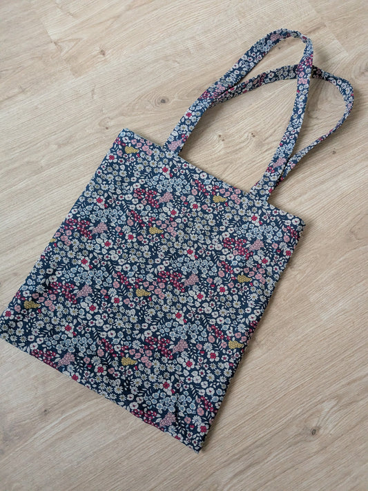 Tragetasche in blau mit Blumenmuster und Innenfutter